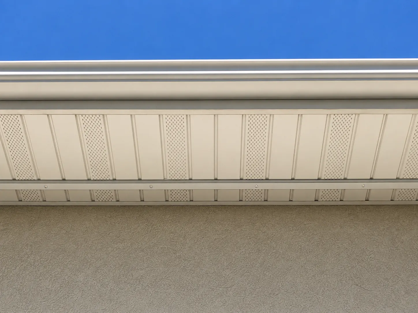 Clean track detail on a permanent outdoor lighting installation